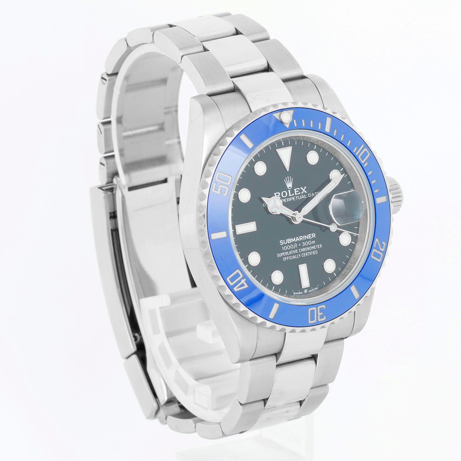 Rolex Submariner 18k White Gold Men's Watch 126619LB - Automatic winding, sapphire crystal, date. 41mm - 18k white gold case with blue Cerachrom bezel; This watch has never been polished, we have elected to leave it that way but can be polished at