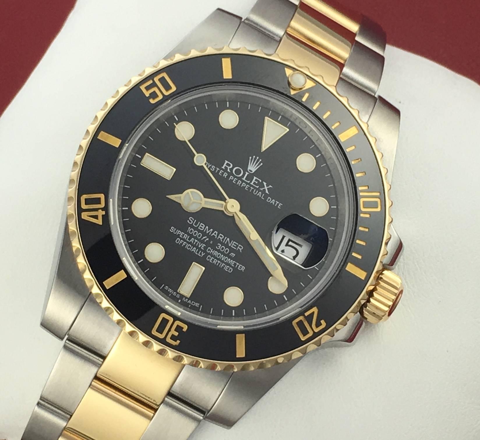 Rolex Mens Submariner Model 116613N at a great price.  Automatic Winding Oyster Perpetual Date Movement.  Features  stainless steel  case with Ceramic Black Bezel insert, diameter 41mm. Stainless steel and 18k Yellow Gold Oyster bracelet with