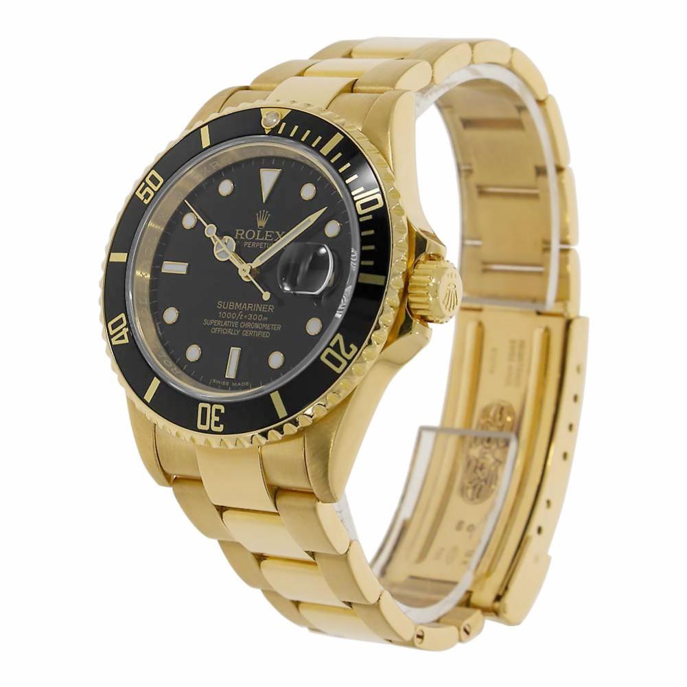 Rolex Submariner Reference #:16618. The Rolex Submariner Date in 18 kt. Yellow Gold, the original diver‚Äôs watch. The 40 mm watch case is made of 18 kt. yellow gold housing the Rolex self-winding mechanical movement and is water resistant up to 300