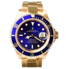 Montre Submariner en or jaune 18 carats avec cadran bleu et violet 16618 non poli, Rolex, 1987