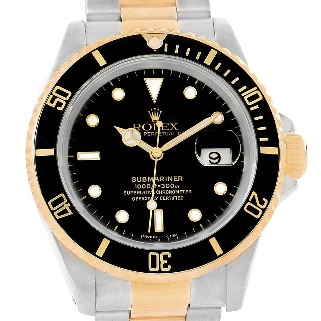 Rolex Submariner 40 Two Tone Steel Yellow Gold Mens Watch 16613. Officially certified chronometer self-winding movement. Stainless steel and 18k yellow gold case 40 mm in diameter. Rolex logo on a crown. Black insert special time-lapse