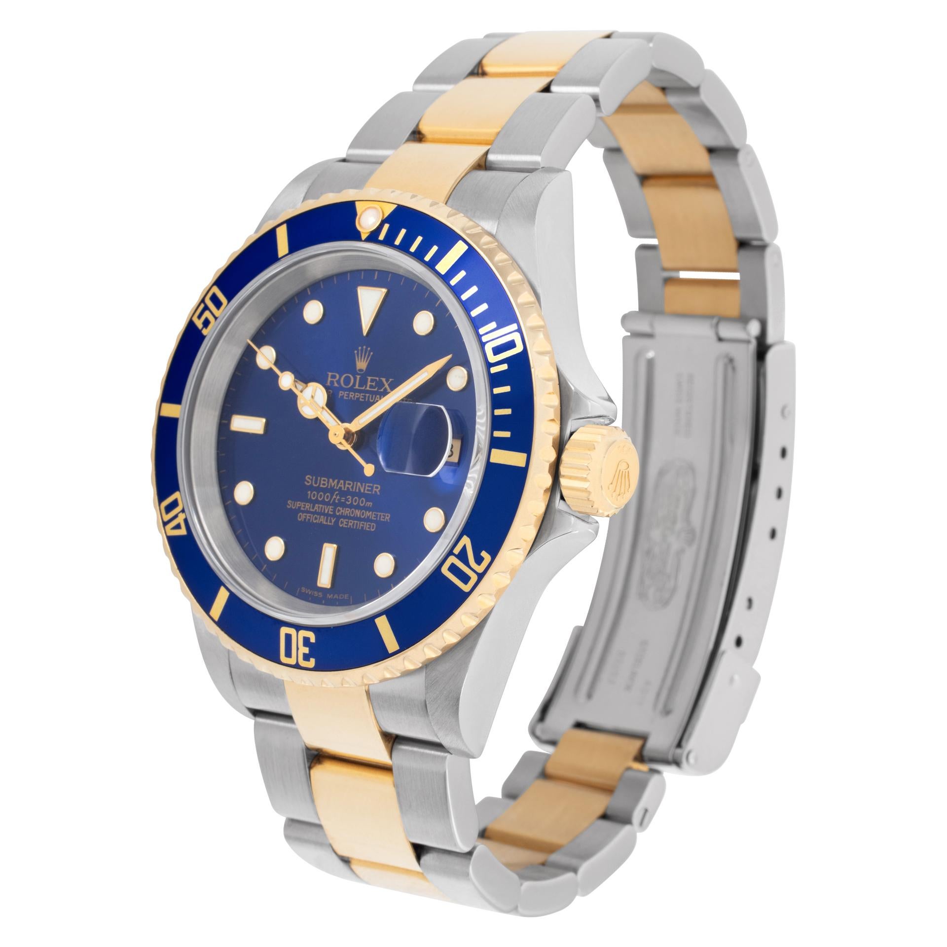 Rolex Submariner in 18k & stainless steel and blue dial wth luminescent stick-dot hour markers. Auto w/ sweep seconds and date. 40 mm case size. **Bank wire only at this price** Ref 16613T. Circa 2005. Fine Pre-owned Rolex Watch. Certified preowned