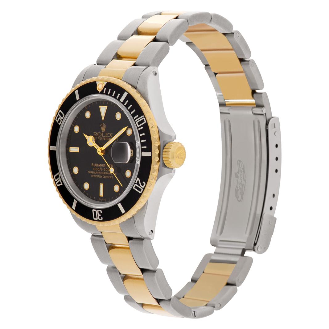 Rolex Submariner in 18k & stainless steel with black dial & bezel. Auto w/ sweep seconds and date. 40 mm case size. Ref 16803. Circa 1986. **Bank Wire Only at this price** Fine Pre-owned Rolex Watch.

Certified preowned Sport Rolex Submariner 16803