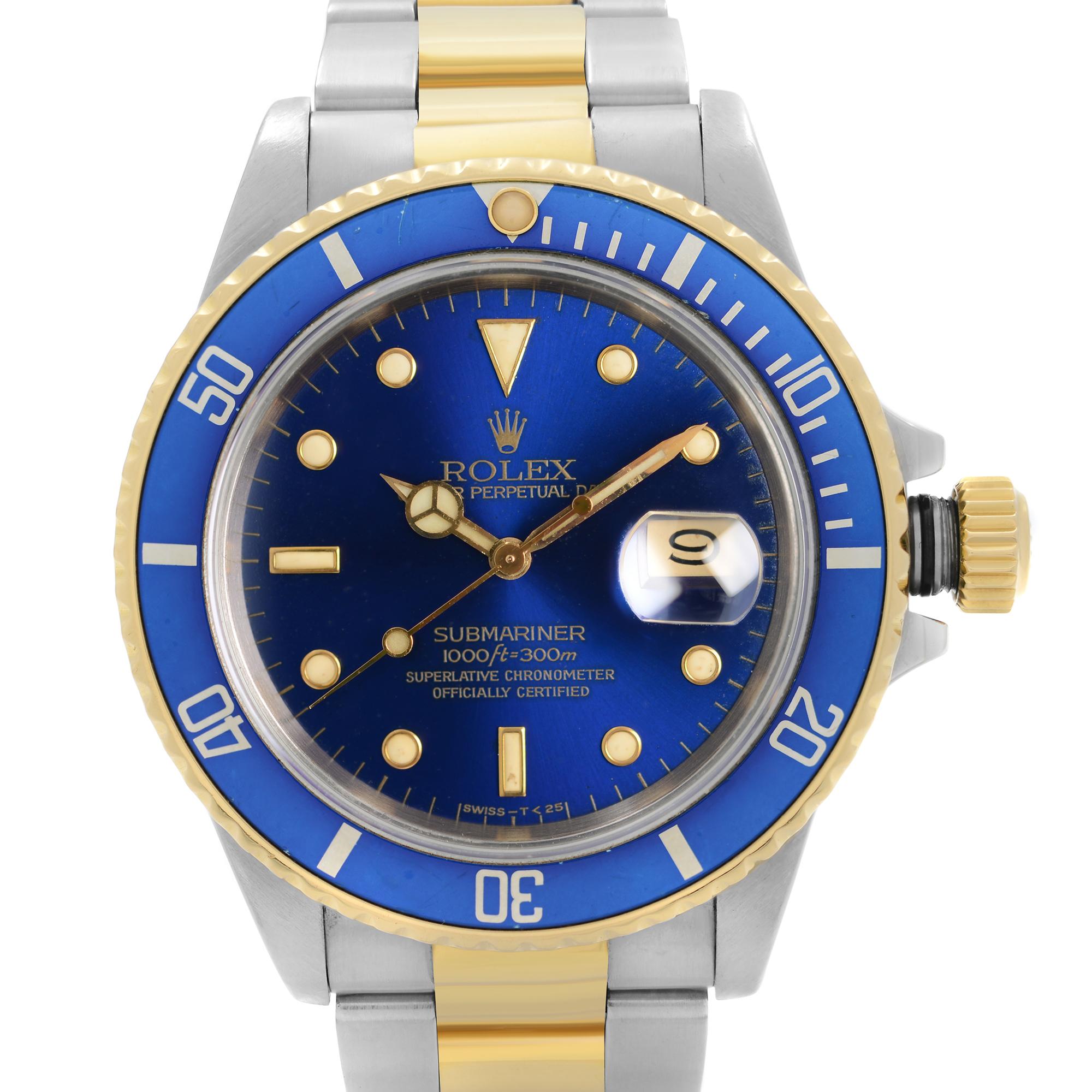 This pre-owned Rolex Submariner 16803 is a beautiful men's timepiece that is powered by an automatic movement which is cased in a stainless steel case. It has a collectible transitional blue/violet dial, round shape face, date dial and has hand
