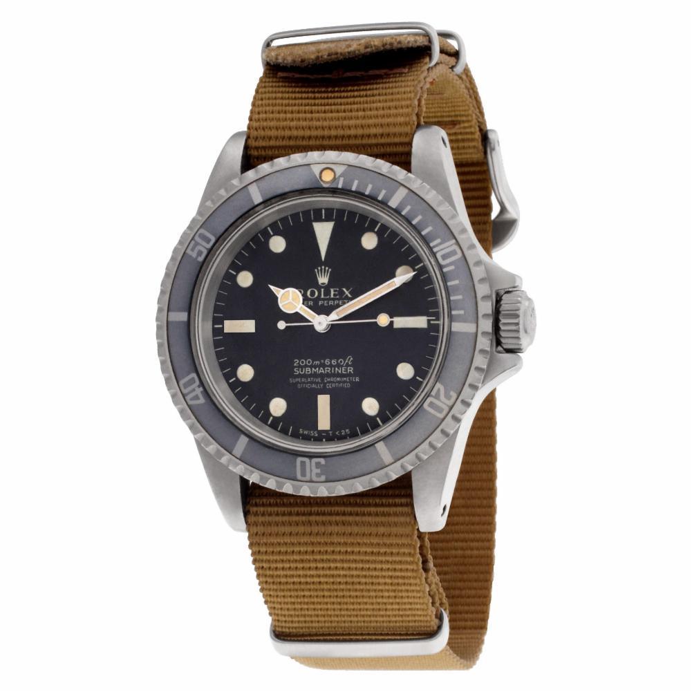 Rolex Submariner Reference #:5512. Vintage and collectible Rolex Submariner in stainless steel with ghost bezel and creamy patina hands on an army tan nato strap. Auto. Ref 5512. Circa 1966. Fine Pre-owned Rolex Watch. Certified preowned Vintage