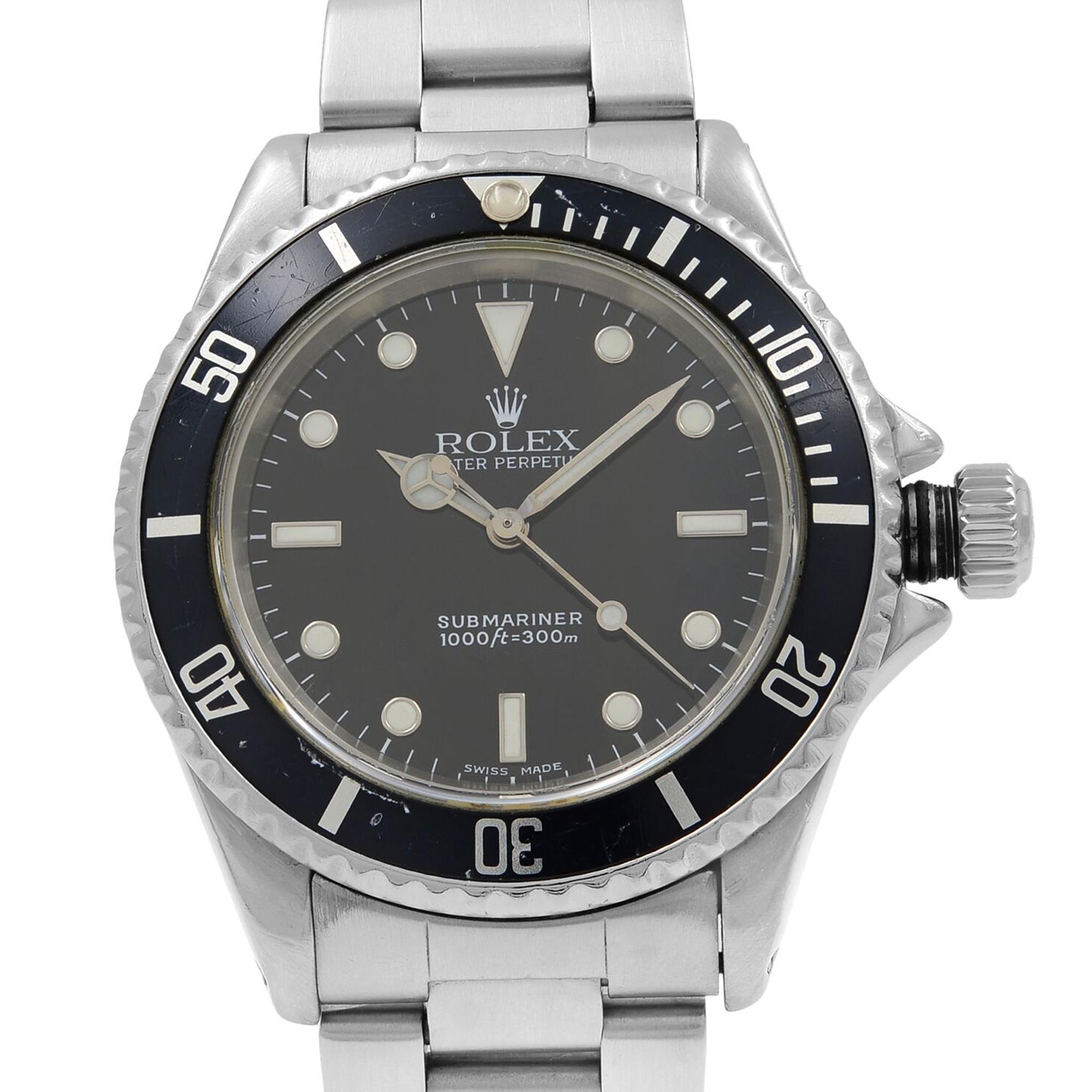 This pre-owned Rolex Submariner  14060M is a beautiful men's timepiece that is powered by a mechanical (automatic) movement which is cased in a stainless steel case. It has a round shape face, no features dial, and has hand sticks & dots style