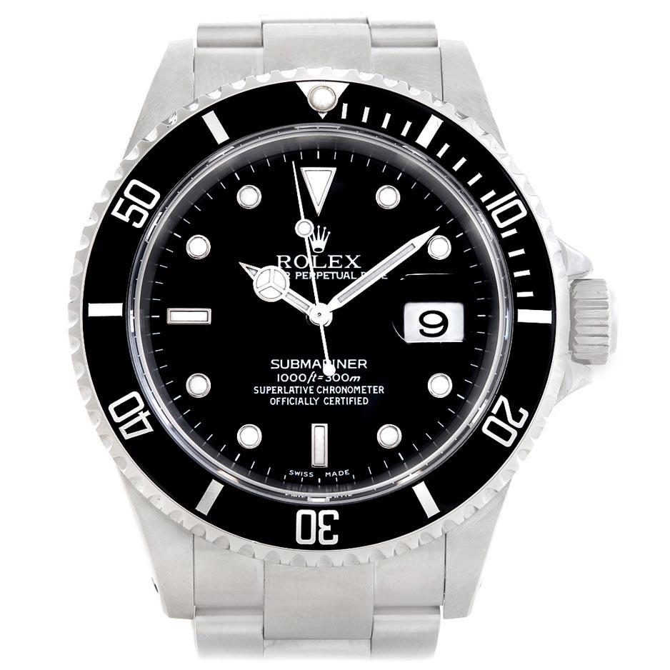 Rolex Submariner 40mm Black Dial Oyster Bracelet Mens Watch 16610 Box. Officially certified chronometer automatic self-winding movement. Stainless steel case 40.0 mm in diameter. Rolex logo on a crown. Special time-lapse unidirectional rotating