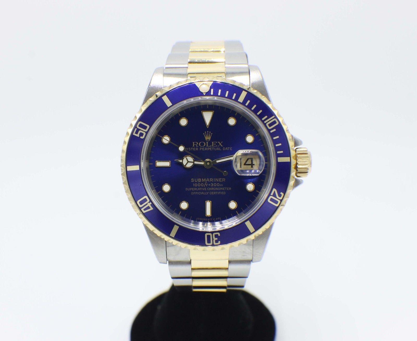 Style Number: 16613
 
Serial: U657***
 
Model: Submariner 
 
Case Material: Stainless Steel 
 
Band: 18K Yellow Gold & Stainless Steel
 
Bezel: Blue 
 
Dial: Blue 
 
Face: Sapphire Crystal 
 
Case Size: 40mm
 
Includes: 
-Rolex Box &