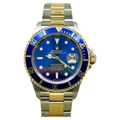 Rolex Submariner Blau 16613 40mm 18K Gelbgold Stahl Box Papiere 2001