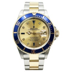Rolex Submariner Blue 16613 Champagne Serti Diamond Dial 18K Yellow Gold Steel