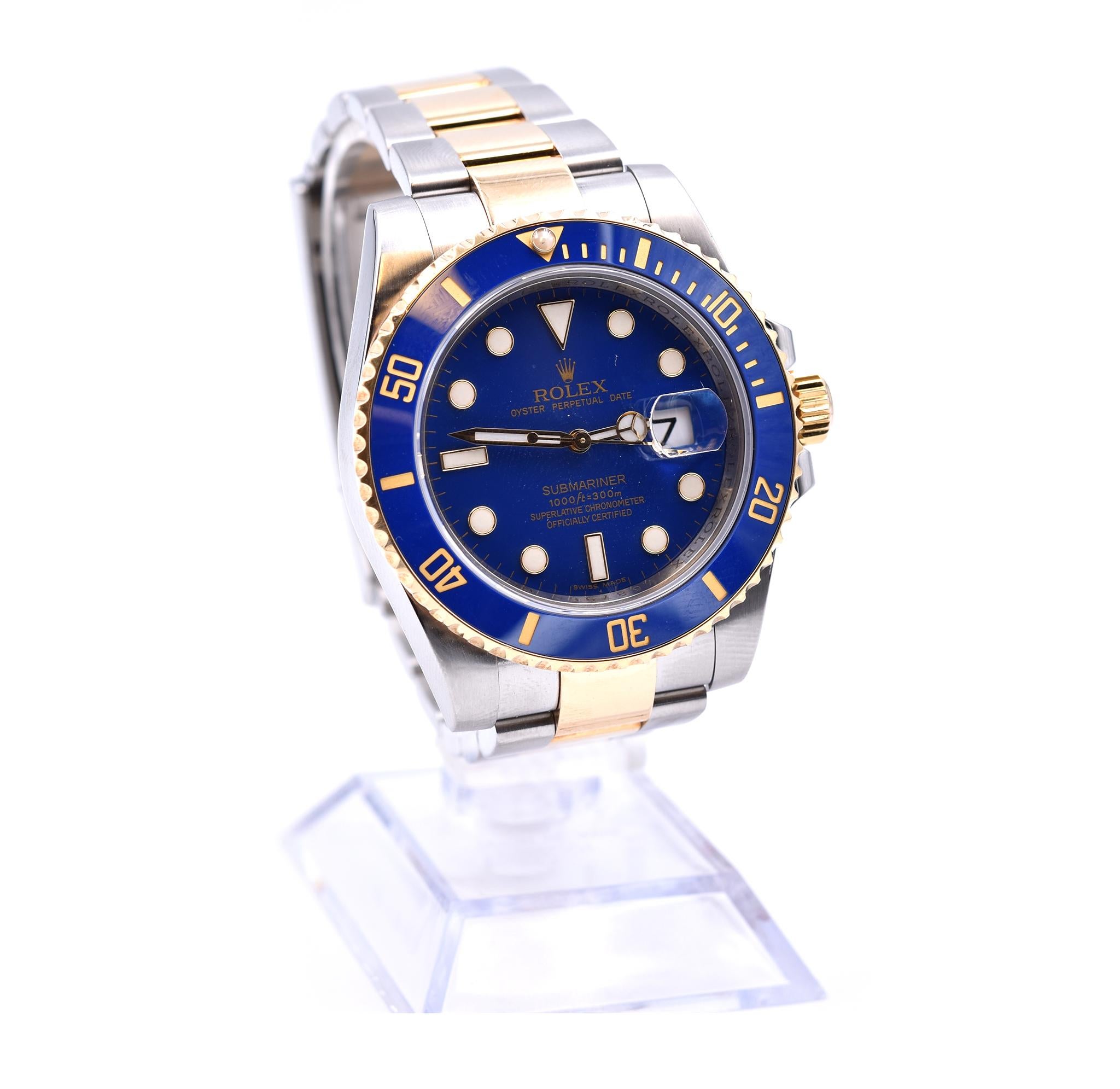Movement: automatic
Function: hours, minutes, seconds, date
Case: round 40mm stainless steel case with blue ceramic 18k yellow gold diving bezel, sapphire protective crystal, screw-down crown, water resistant to 300 meters
Band: stainless steel and