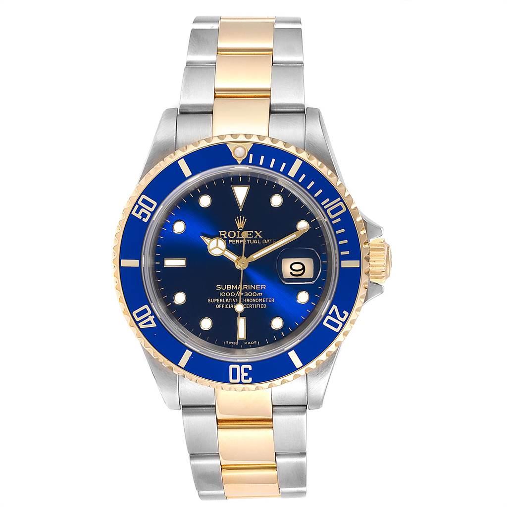 Rolex Submariner Blue Dial and Bezel Steel Gold Watch 16613 Box Papers. Officially certified chronometer self-winding movement. Stainless steel and 18k yellow gold case 40 mm in diameter. Rolex logo on a crown. Blue insert special time-lapse