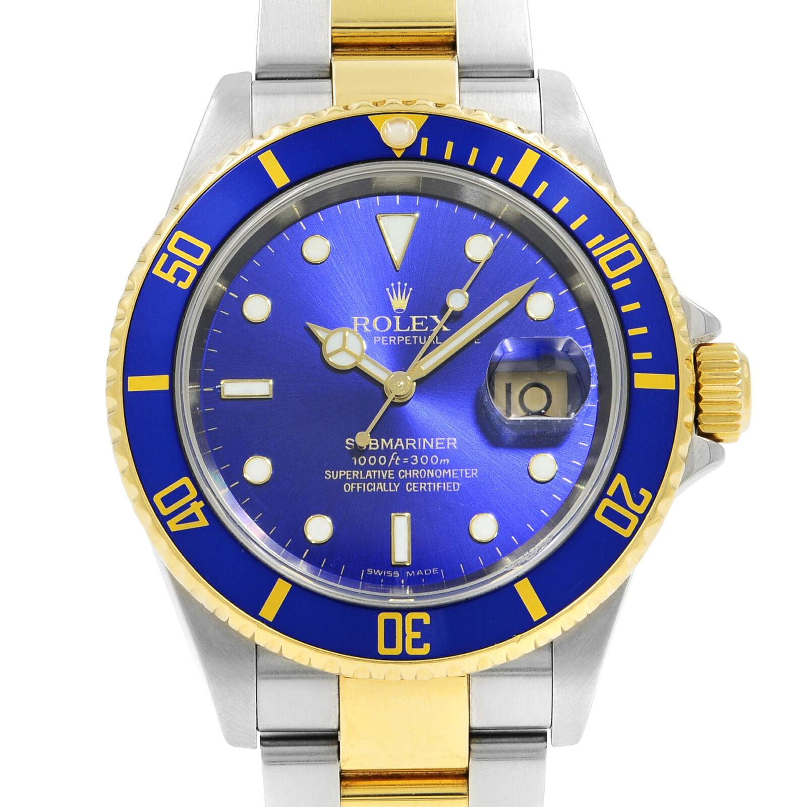 This pre-owned Rolex Submariner 16613 is a beautiful men's timepiece that is powered by an automatic movement which is cased in a stainless steel case. It has a round shape face, date dial, and has hand sticks & dots style markers. It is completed