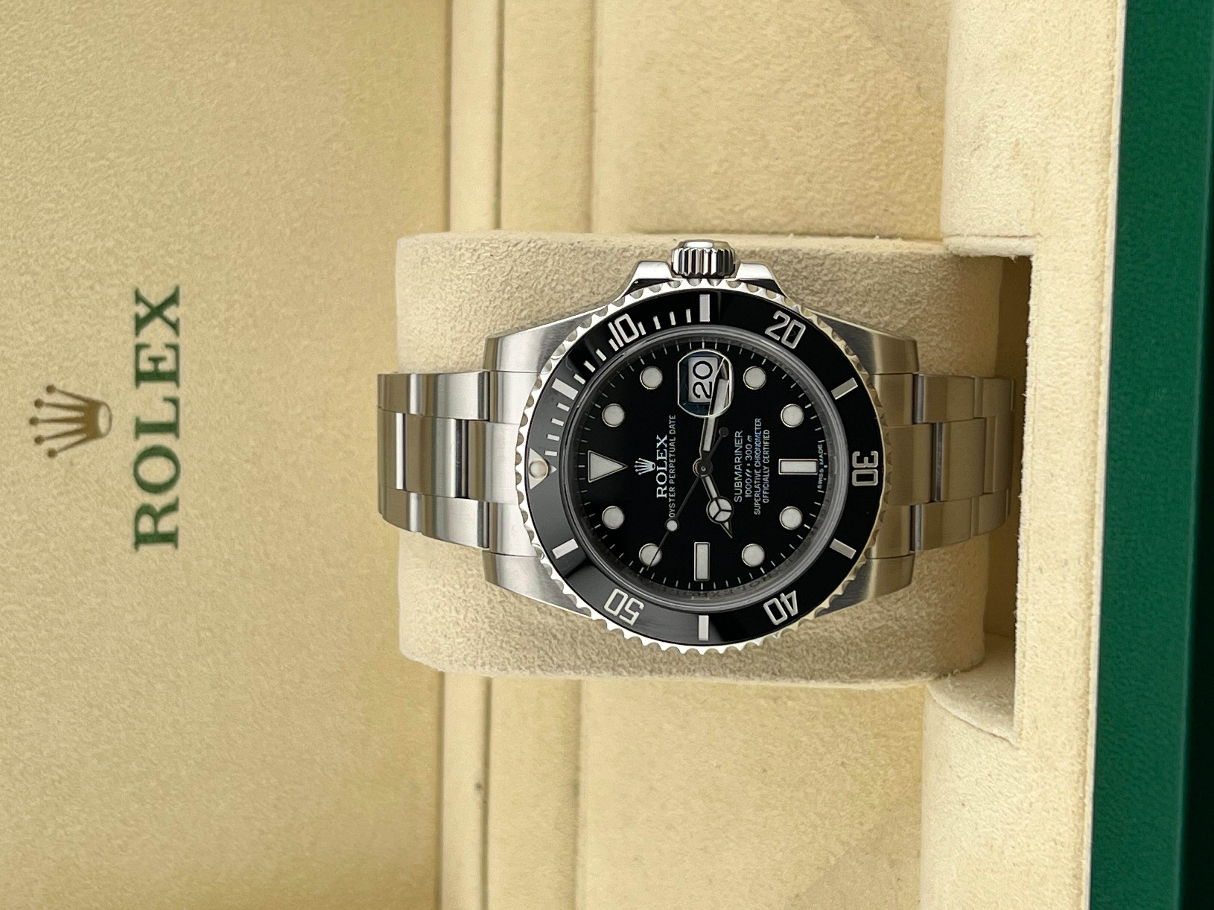 Style Number: 116610LN
Serial: 97E08***
Year: 2010-2020
Model: Rolex Submariner Date
Case Material: Stainless Steel 
Band: Stainless Steel 
Bezel: Black Ceramic Bezel 
Dial: Black Dial 
Face: Sapphire Crystal 
Case Size: 40mm 
Includes: 
-Rolex