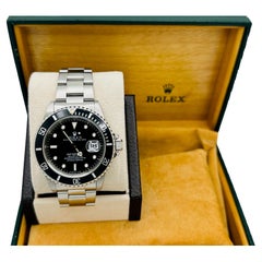 Rolex Submariner Date 16610 40mm Black Stainless Steel Box Papers