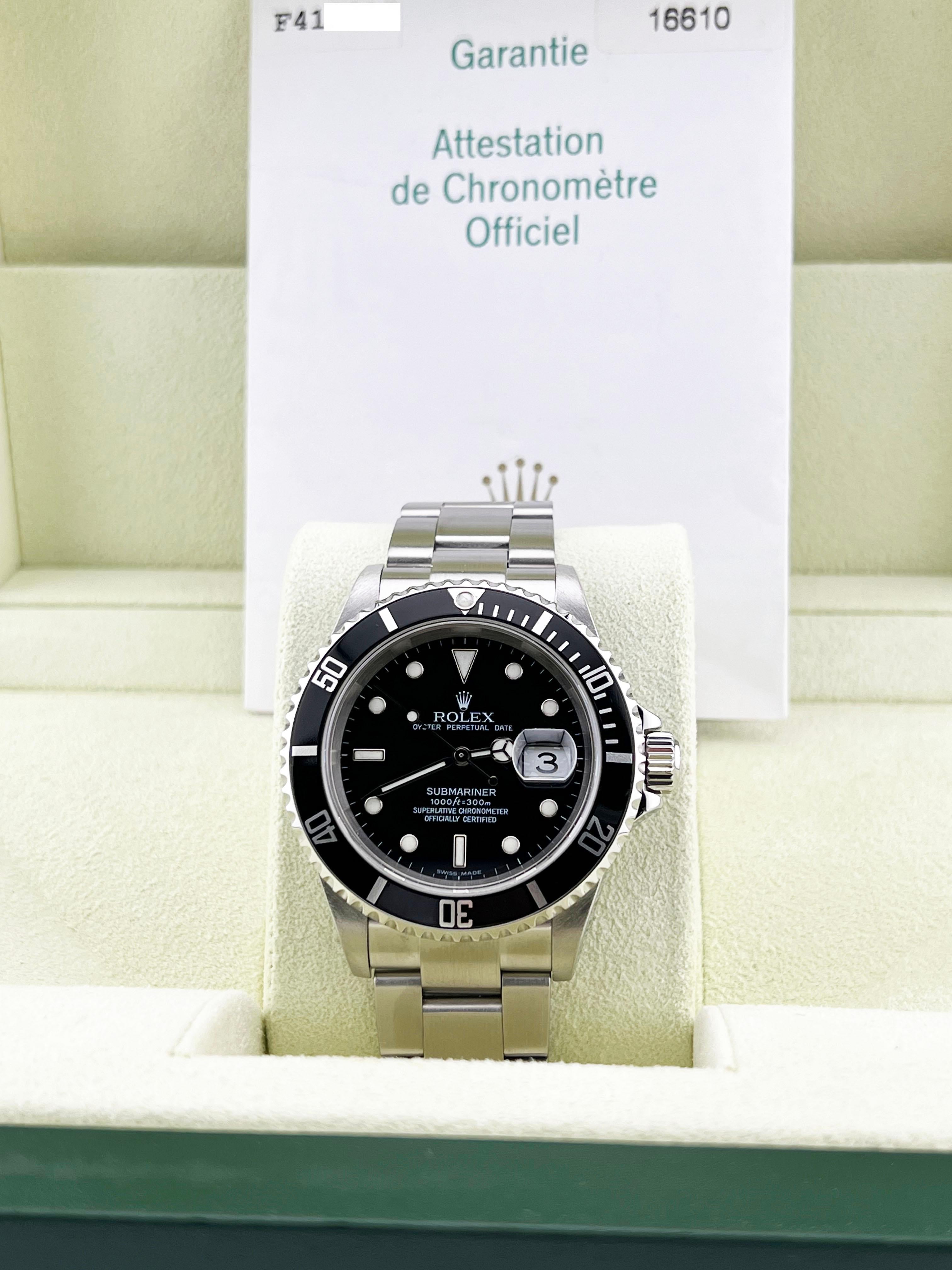 Numero di stile: 16610
Seriale: F410***
Anno: 2004
Model: Rolex Submariner 
Materiale della cassa: Acciaio inossidabile 
Fascia: Acciaio inossidabile 
Lunetta: nera 
Quadrante: Quadrante nero 
Volto: Cristallo di zaffiro 
Dimensioni della cassa: 40