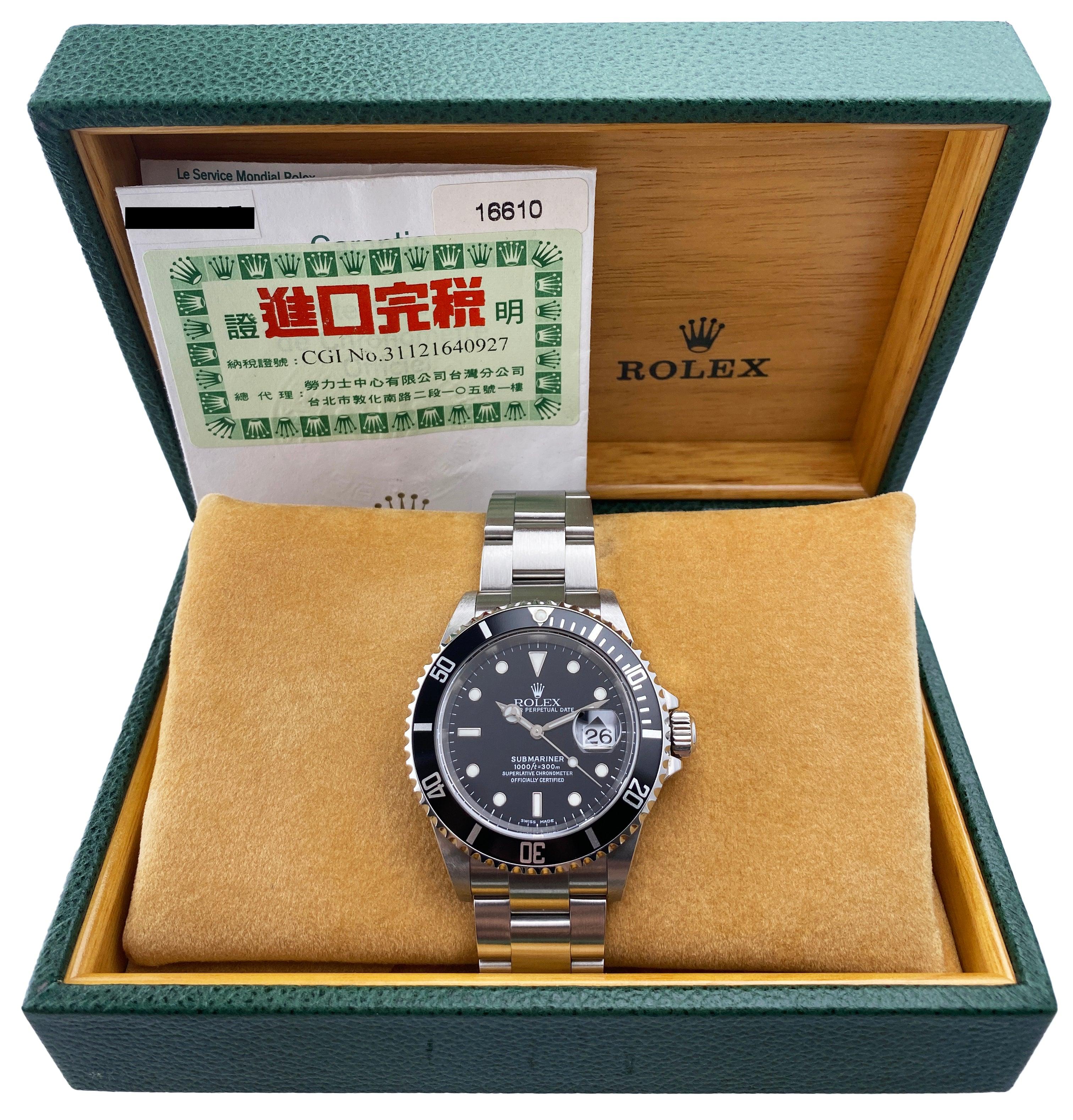 Rolex Oyster Perpetual Date Submariner 16610 Mens Watch. 40mm stainless steel case. Unidirectional rotating stainless steel bezel with black insert. Black dial with steel luminous hands and markers. Date display at 3 o'clock position. Stainless