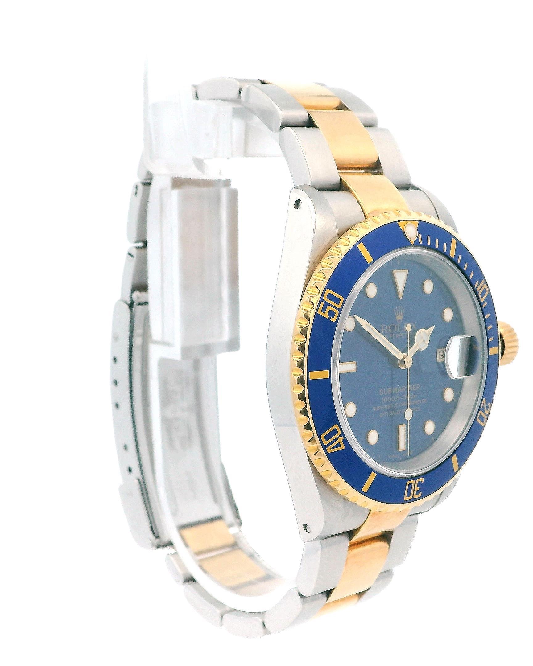 The Rolex Oyster Perpetual Submariner Date 16613 Men's Watch features a 40mm stainless steel case. It has a unidirectional rotating bezel made of 18K yellow gold with a blue insert. The blue dial includes Mercedes-style gold luminous hands and a