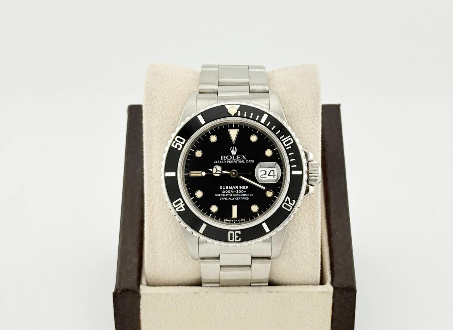 Style Number: 168000
Serial: R59****
Year: 1988
Model: Rolex Submariner Date
Case Material: Stainless Steel
Band: Stainless Steel
Bezel: Black
Dial: Black
Face: Sapphire Crystal
Case Size: 40mm

Includes: 

-Elegant Watch Box

-Certified Appraisal