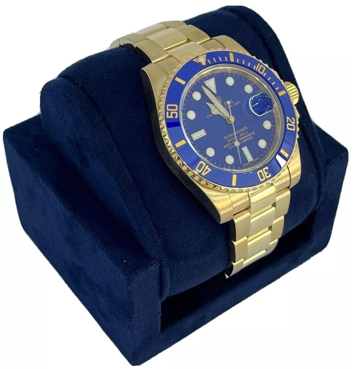 A true icon of luxury and performance, the Rolex Submariner Date Ref. 116618 is crafted from solid 18K yellow gold, pairing robust functionality with unmistakable elegance. Measuring 40mm, this legendary dive watch features a bold blue dial with