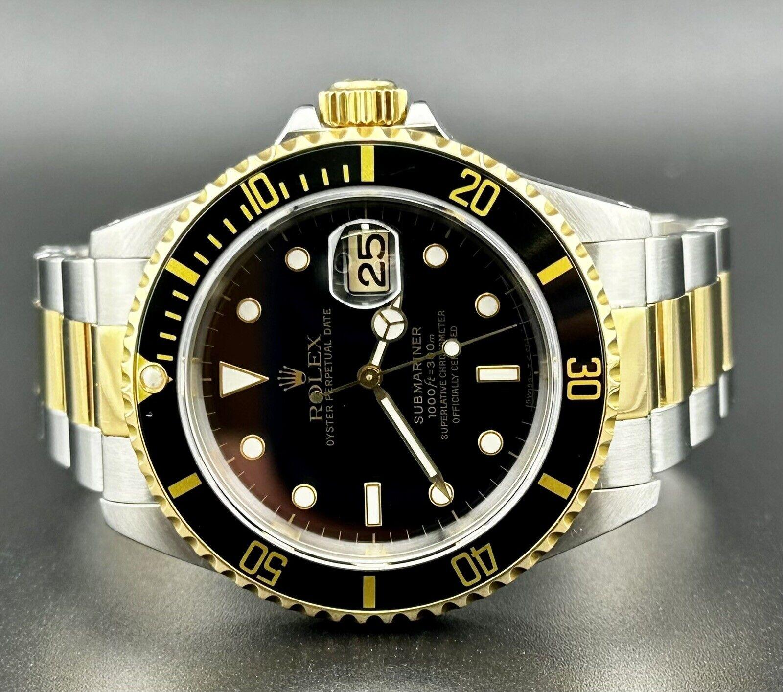 Rolex Submariner 40mm. A Pre Owned Watch with Original Box and Papers. Watch is 100% Authentic and Comes with Swiss Ice Authenticity Card. Watch Reference is 16613 and is in Great Condition. Dial Color is Black and Material 18k Yellow Gold and