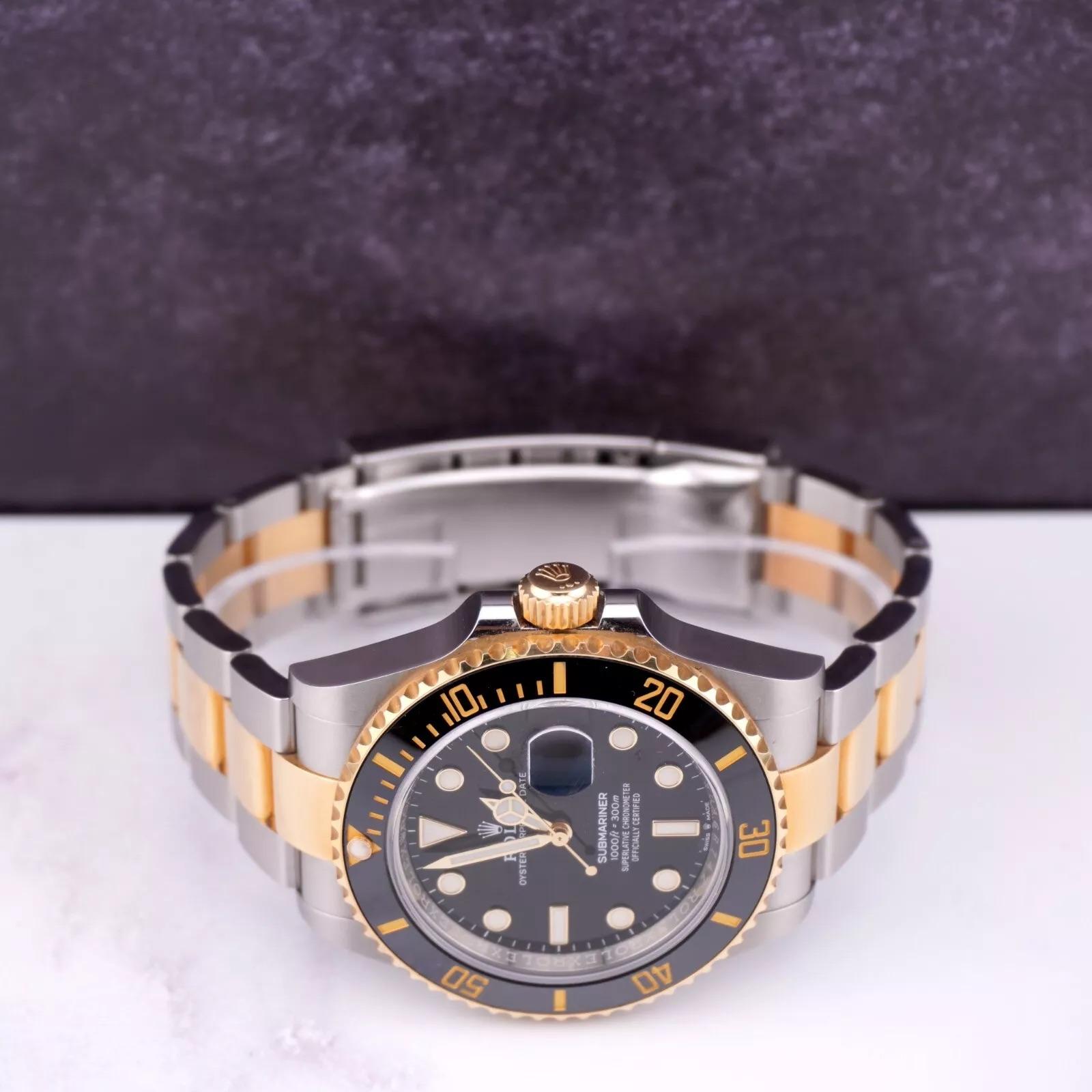 Rolex Submariner Date 40mm Watch

Pre-owned w/ Original Box & Card
100% Authentic Authenticity Card
Condition - (Excellent Condition) - See Pics
Watch Reference - 126613LN
Model - Submariner
Dial Color - Black
Material - 18k Yellow Gold/Stainless