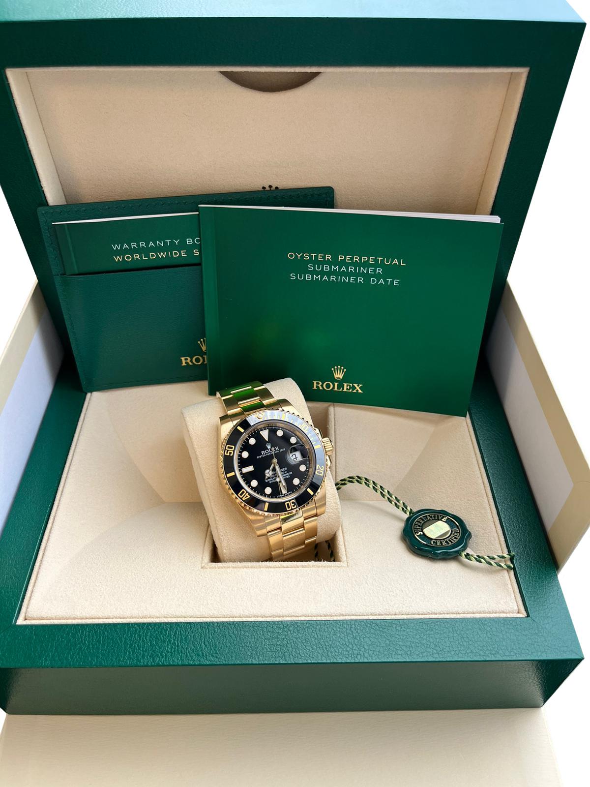 The Rolex Submariner Date is designed with a 40mm 18-carat yellow gold case with oyster architecture and a rotating black ceramic bezel. The rich black dial features a date display and luminescent hour markers and hands which makes it legible
