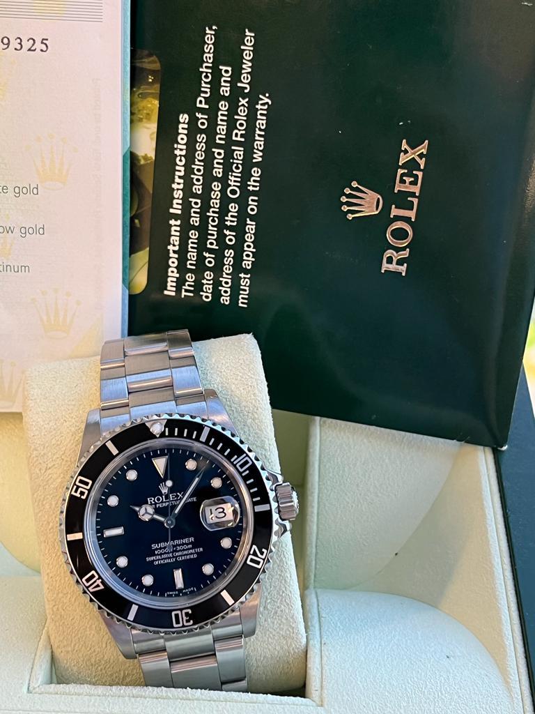 Rolex Submariner Edelstahl Oyster Herrenuhr 16610 mit schwarzem Zifferblatt 8