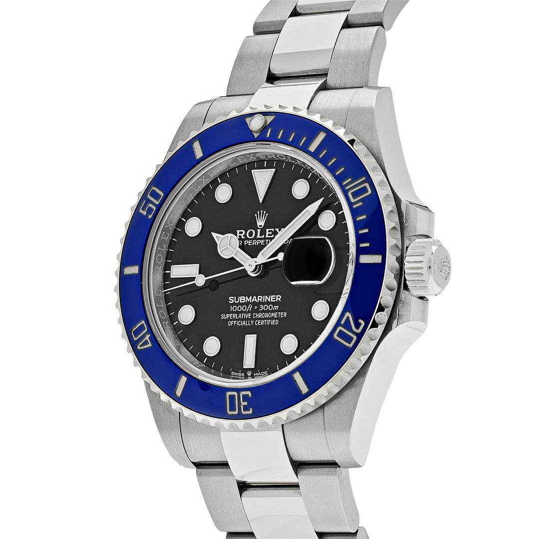 The Rolex Submariner Date exemplifies the historic links between the world of Rolex and diving. Designed with a 41mm 18-carat white gold case with oyster architecture that features a blue ceramic rotating bezel. The stunningly rich black dial