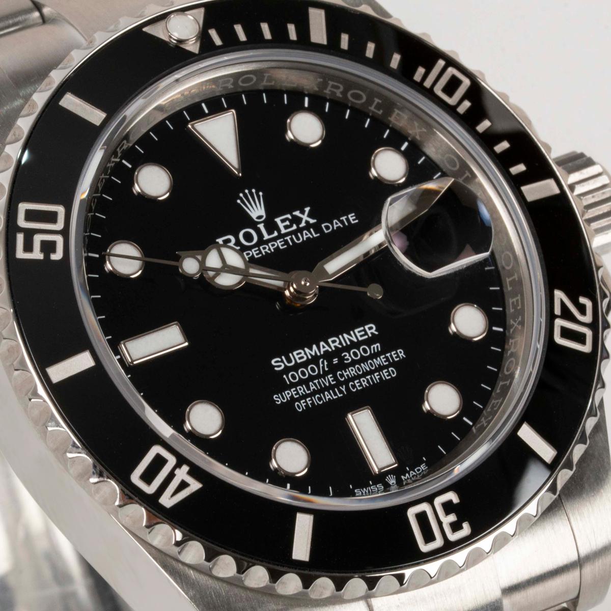 A 41mm Submariner Date in Oystersteel by Rolex. Featuring a black dial, complemented by a black ceramic unidirectional rotatable bezel with 60-minute graduations coated in platinum.

Fitted with scratch-resistant sapphire crystal and a self-winding