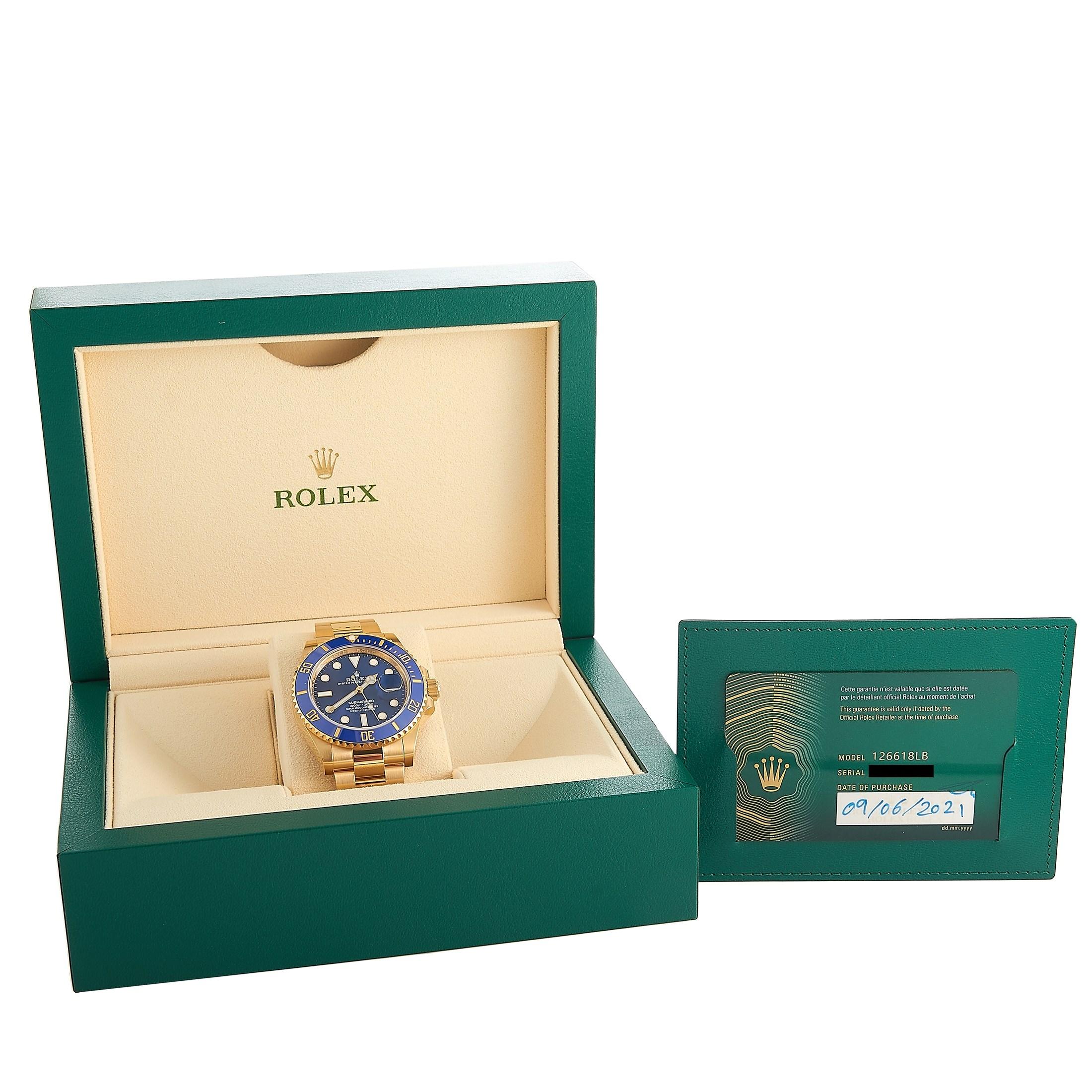 gold rolex submariner blue face