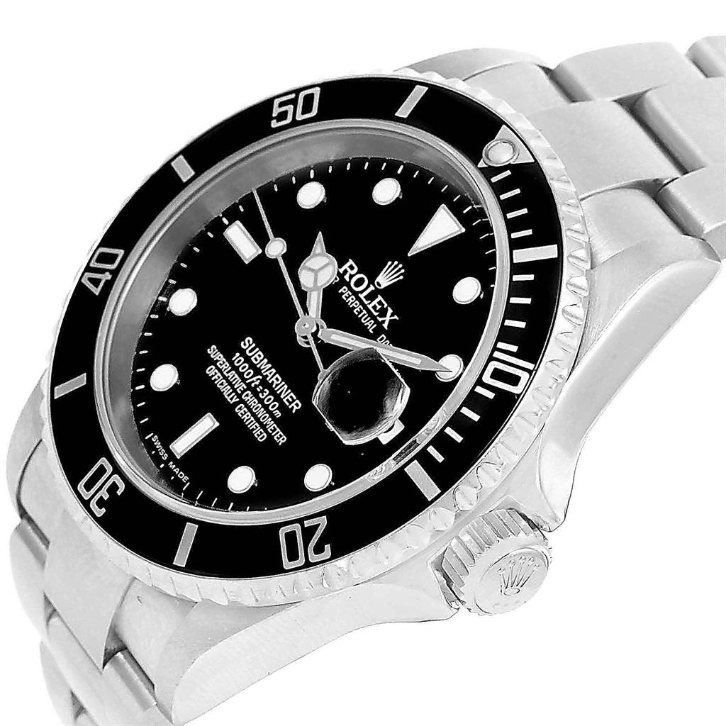 Rolex Submariner Date Black Dial Automatic Mens Watch 16610. Officially certified chronometer automatic self-winding movement. Stainless steel case 40 mm in diameter. Rolex logo on a crown. Special time-lapse unidirectional rotating bezel. Scratch