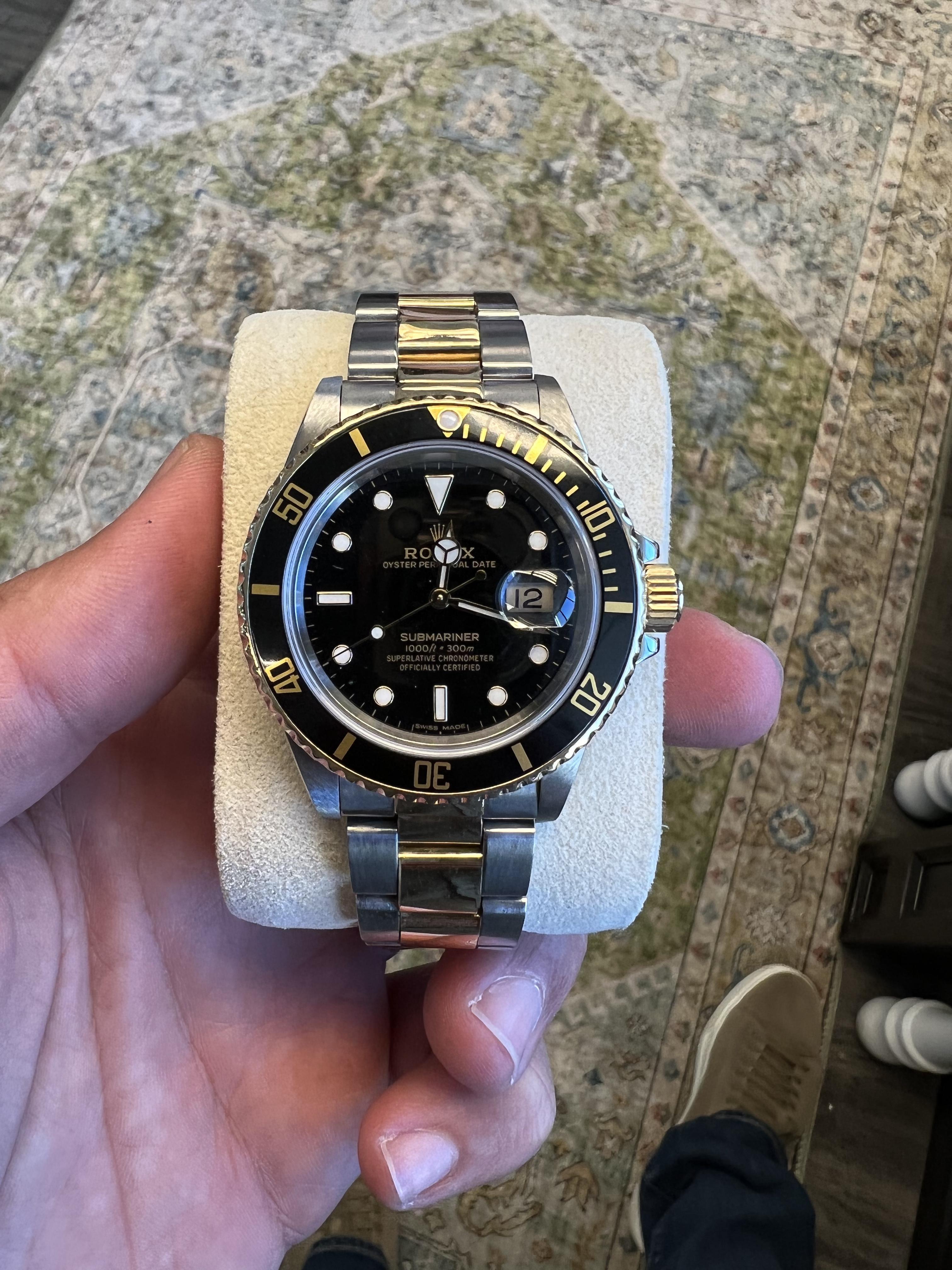 BRAND: Rolex
MODEL: Submariner Date
REFRENCE: 16803
SIZE: 40mm
CASE: 18k Yellow Gold & Stainless Steel
DIAL: Black
BEZEL: Black
BAND: Oyster 18k Yellow Gold & Stainless Steel
MOVEMENT: Automatic

2021 service papers
No box or papers
Good condition,