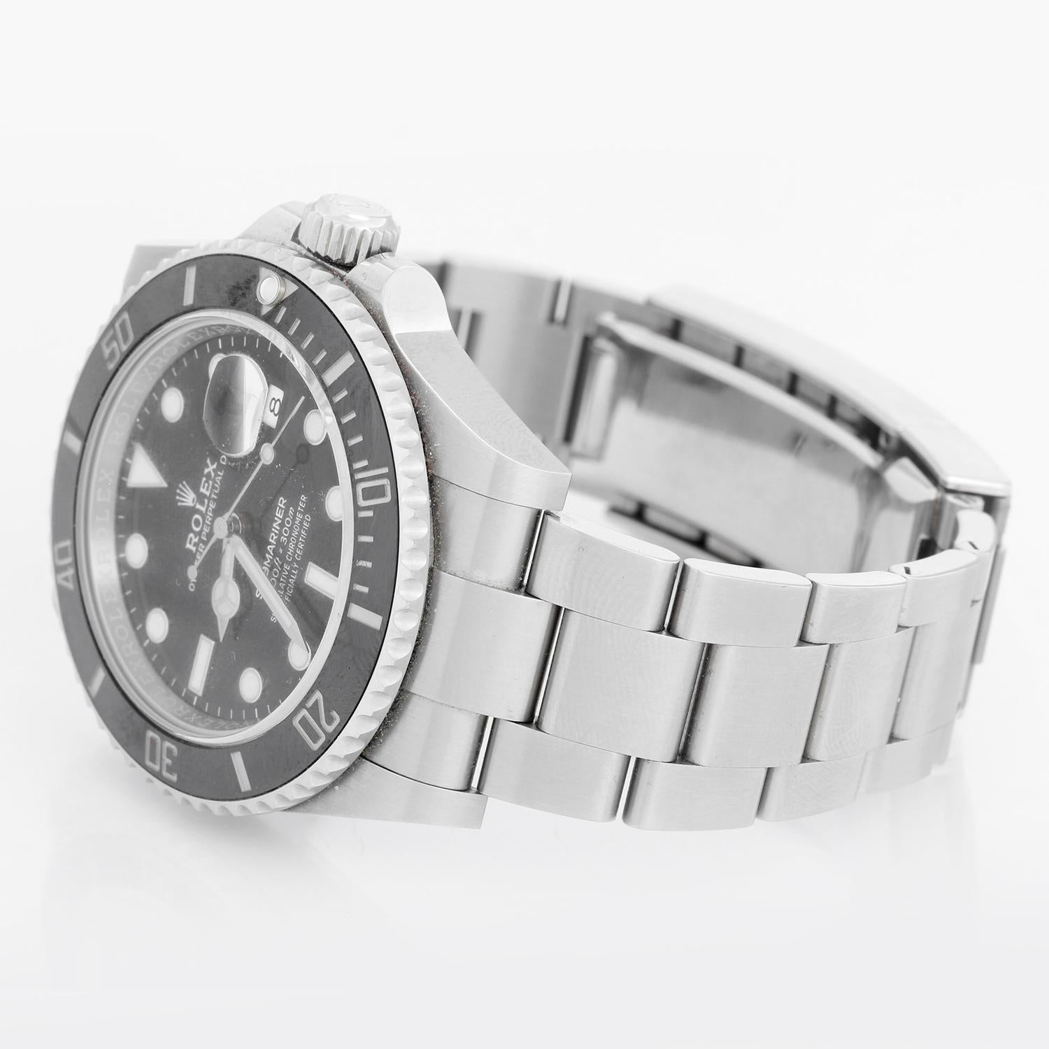 Rolex Submariner Date Men's Stainless Steel Watch 126610LN - Automatic winding, 31 jewels, pressure proof to 1,000 feet. Stainless steel case with time-lapse Cerachrom black bezel (41mm). Black dial with luminous markers; date at 3 o'clock.
