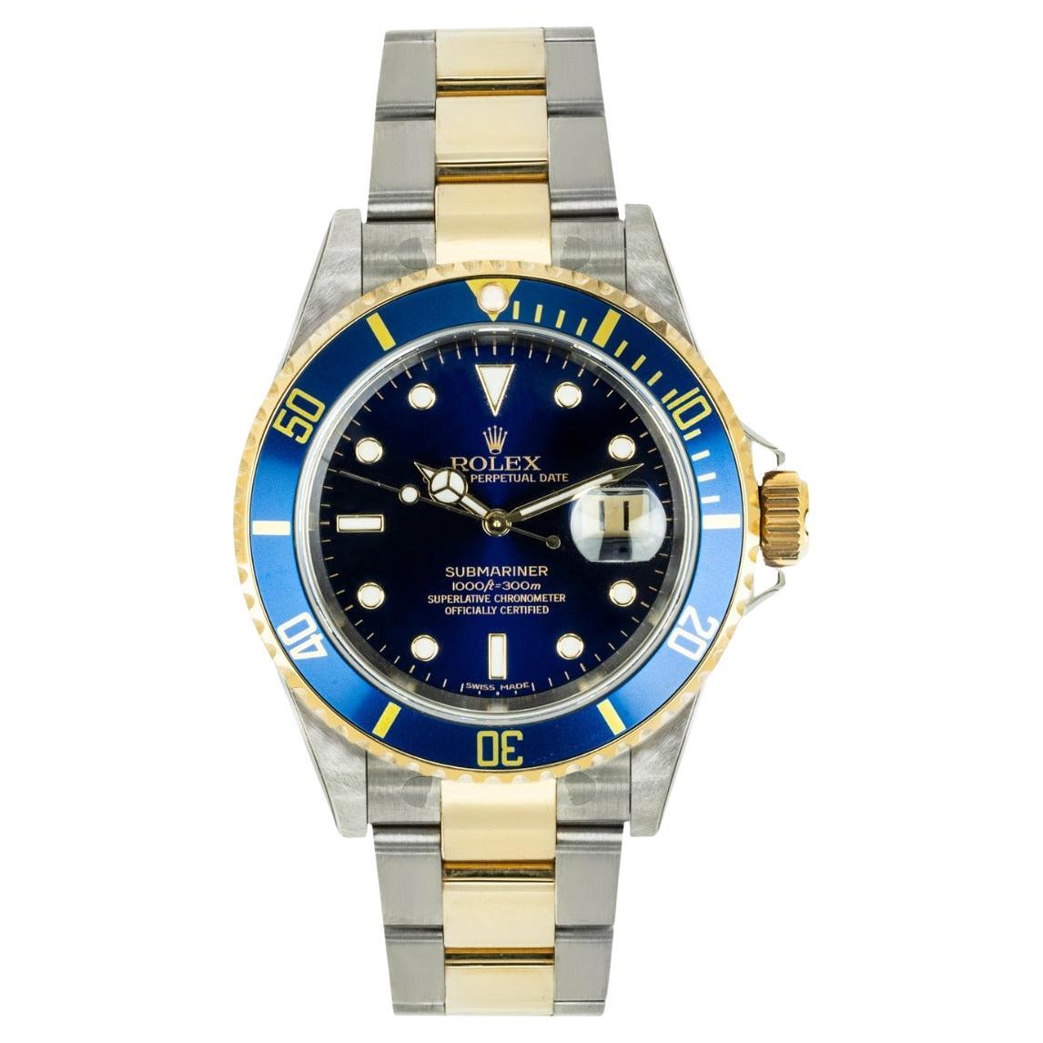 Rolex Submariner Date Nos avec cadran bleu en acier inoxydable et or jaune 16613