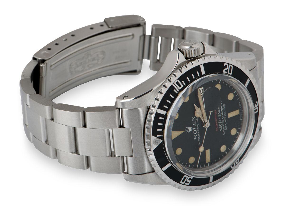 rolex submariner with red writing