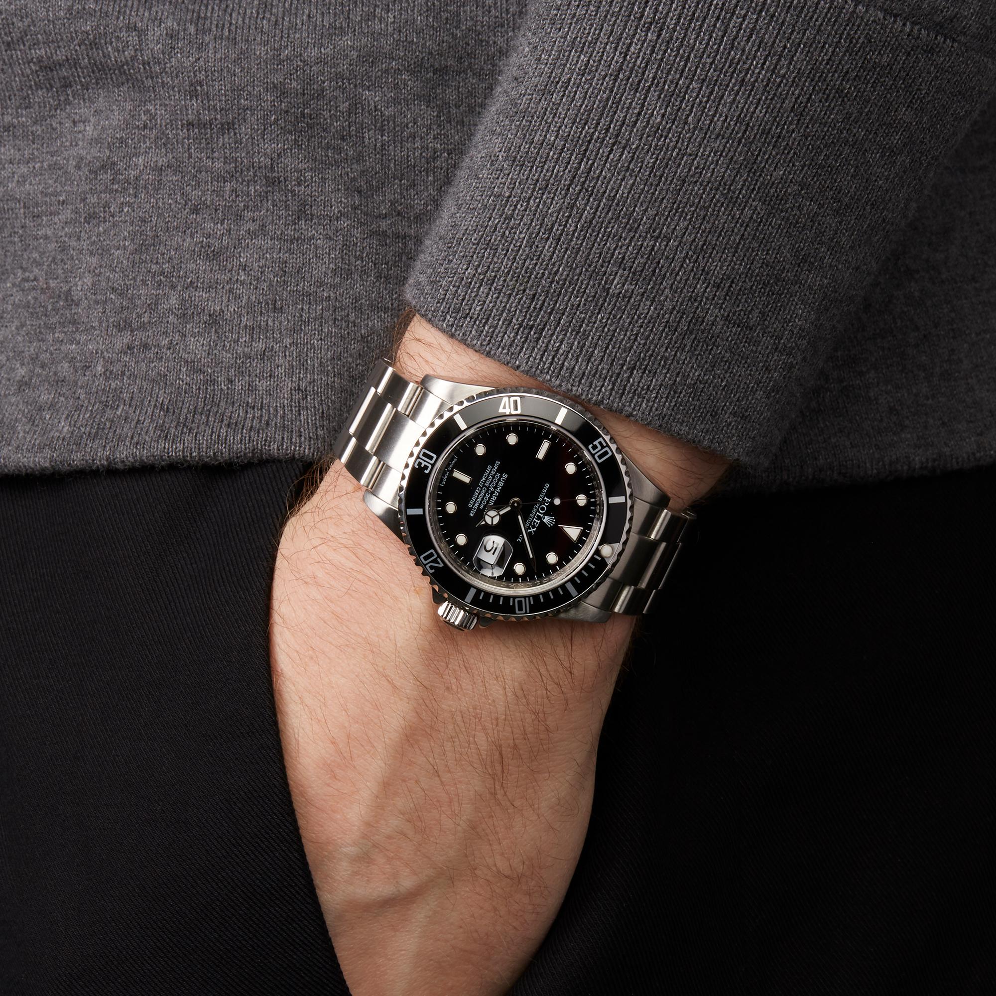 rolex submariner black on wrist
