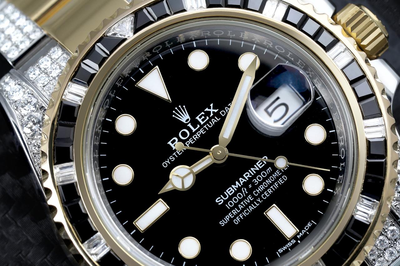 Rolex Submariner Date Two Tone Custom Diamond Watch with Diamond Bezel and Side Diamond Bracelet 116613

Never worn watch, discontinued model.