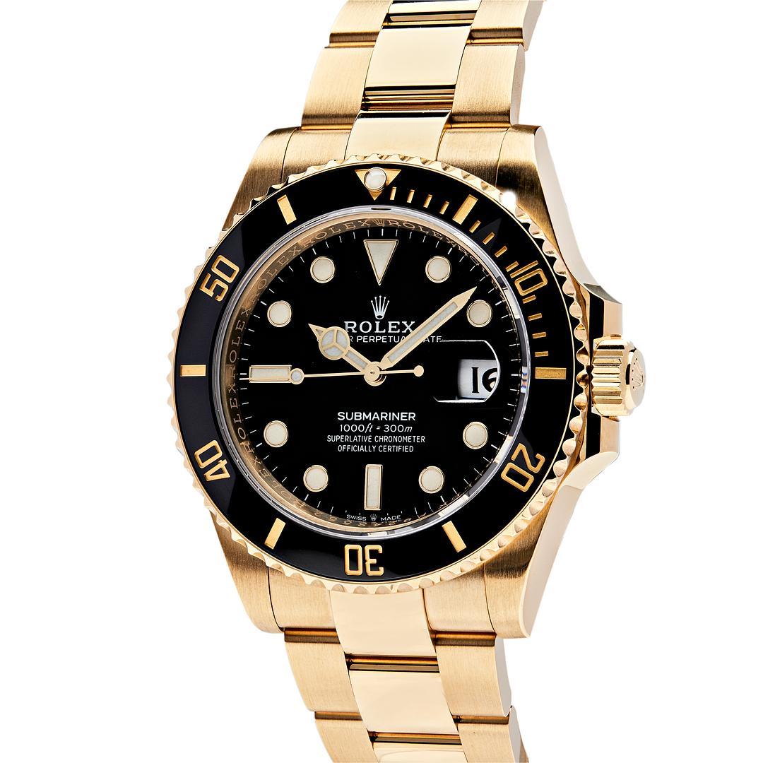 The Rolex Submariner Date is designed with a 41mm 18-carat yellow gold case and a black ceramic bezel that rotates unidirectionally. The rich black dial features date display and luminescent hour markers and hands which makes it legible underwater