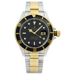 Montre automatique Rolex Submariner Holes en acier avec cadran noir et trous en or 18 carats pour hommes 16613