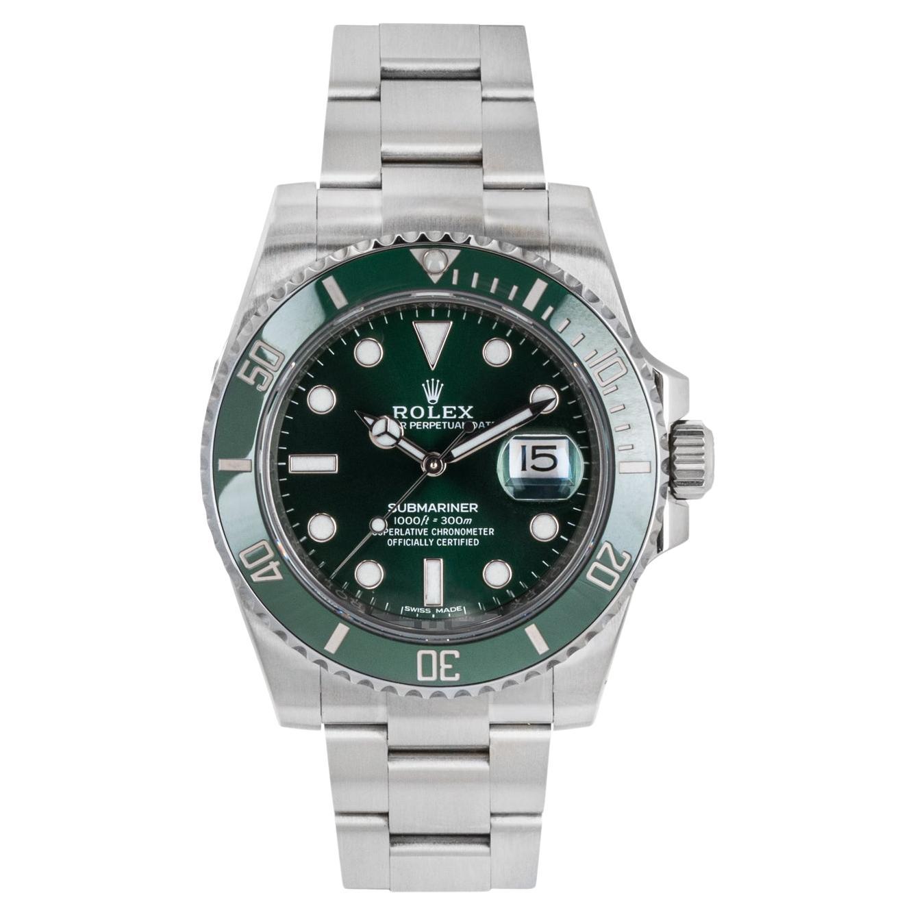 A 40mm Submariner Date Hulk in Oystersteel by Rolex. Featuring a green dial with a date aperture and a green unidirectional rotatable ceramic bezel set with 60-minute graduations. The Oyster bracelet comes equipped with a folding Oysterlock clasp.