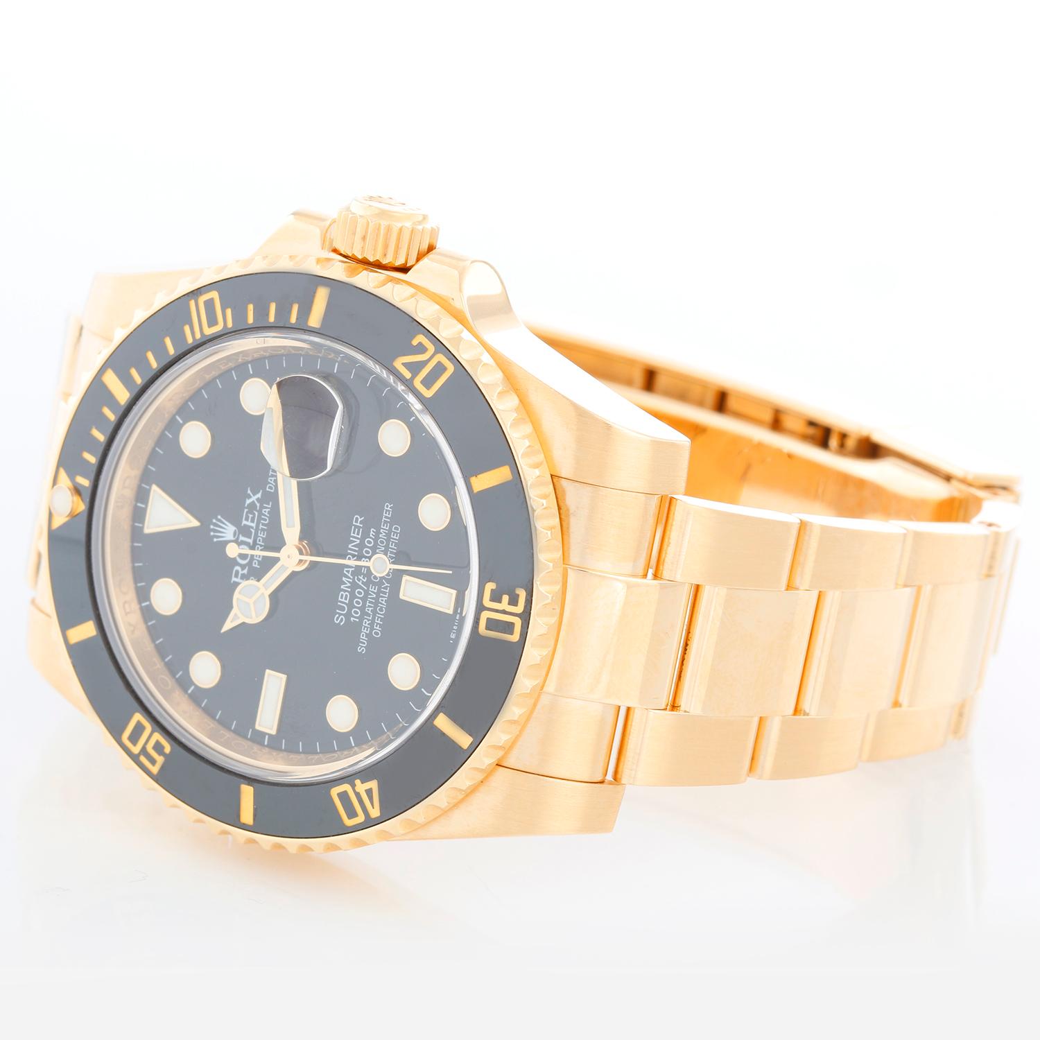 Rolex Submariner Men's 18k Gold Diver's Watch 116618 - Automatic winding, Quickset, sapphire crystal. 18k yellow gold case with rotating ceramic Cerachrom bezel with black insert (40mm diameter). Black dial with luminous style markers. 18k yellow