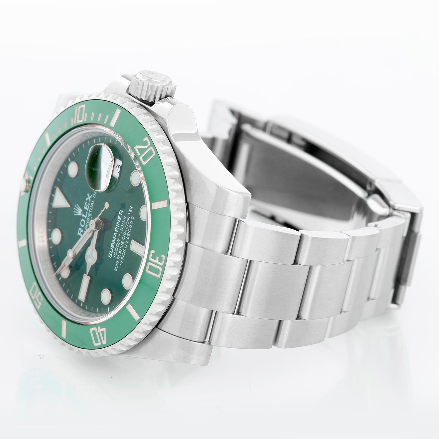 Rolex Submariner Men's Stainless Steel Green Dial Watch 116610LV - Automatic winding, 31 jewels, pressure proof to 1,000 feet. Stainless steel case with green time-lapse Ceramic Cerachrom bezel (40mm diameter). Green dial with luminous markers; date