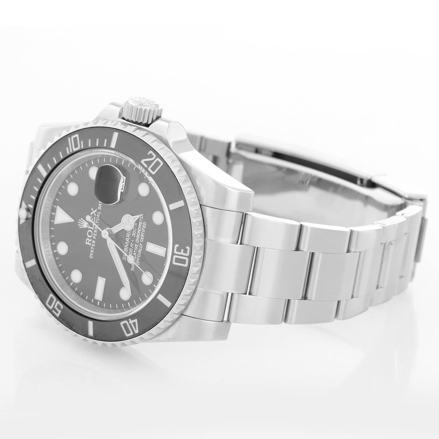 Rolex Submariner Men's Stainless Steel Watch 116610 - Automatic winding, 31 jewels, pressure proof to 1,000 feet. Stainless steel case with time-lapse Cerachrom bezel . Black dial with luminous markers; date at 3 o'clock. Stainless steel and Oyster