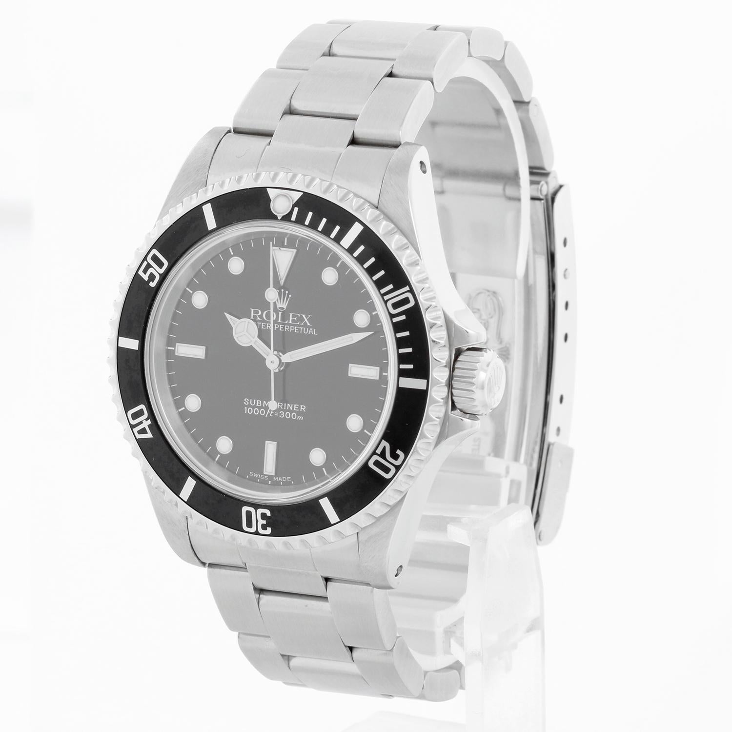 Rolex Submariner Men's  Stainless Steel Watch 14060M - Automatic winding, 31 jewels, Quickset, sapphire crystal. Stainless steel case (40mm diameter). Black dial with luminous hour markers. Stainless steel Oyster bracelet with flip-lock clasp.