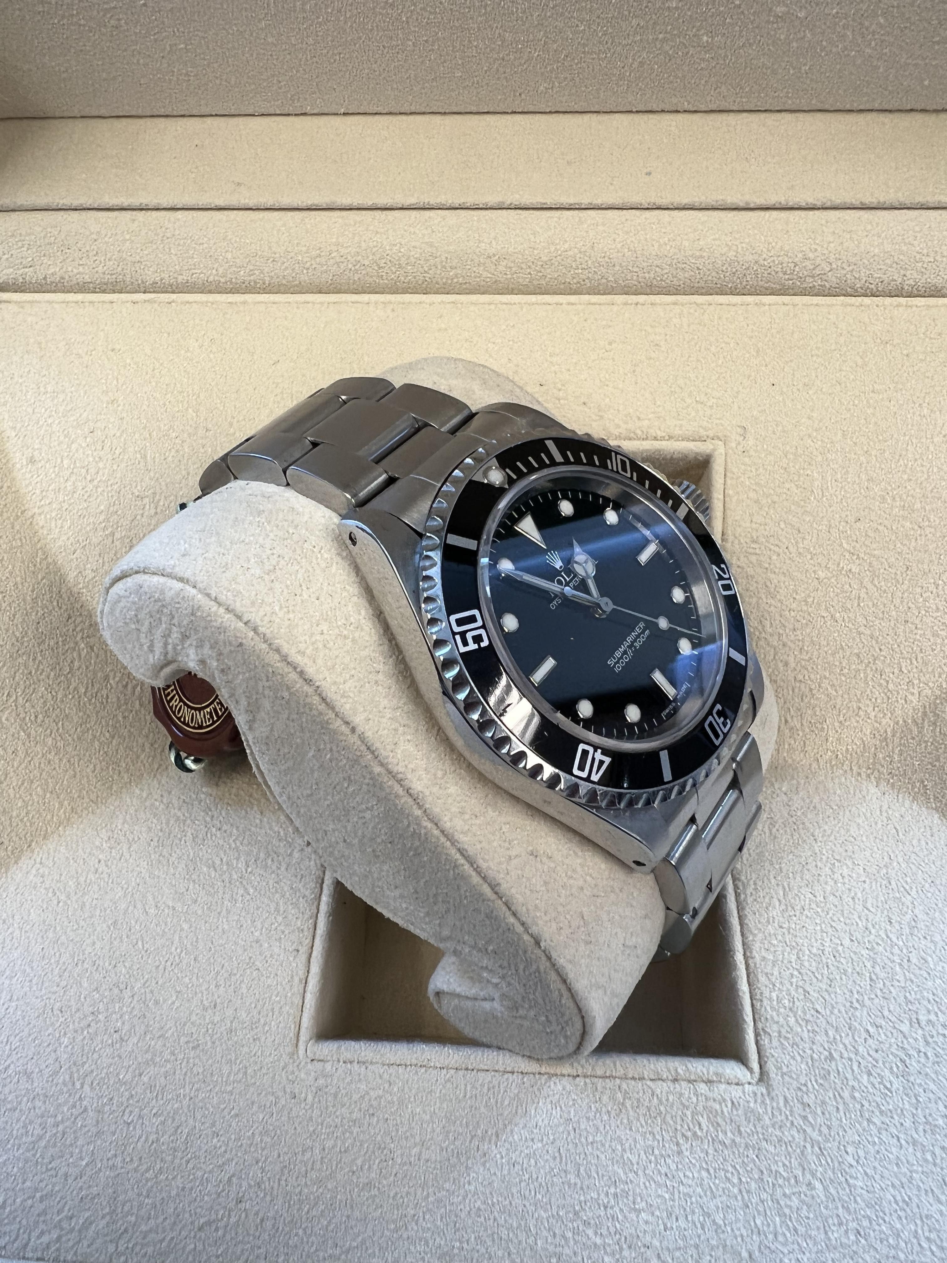 Rolex Submariner (No Date) Certified 14060M In Good Condition For Sale In BEVERLY HILLS, CA