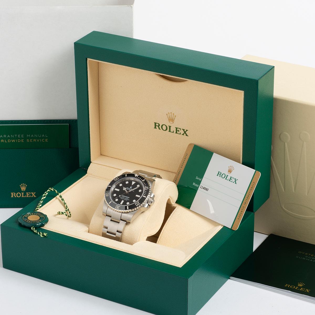 Our iconic Rolex Submariner 'no date' is one of the now discontinued reference 114060. Rarely available in 'new' condition, this example is unworn (with all protective stickers in place) since purchased in December 2018, from a recognised UK Rolex