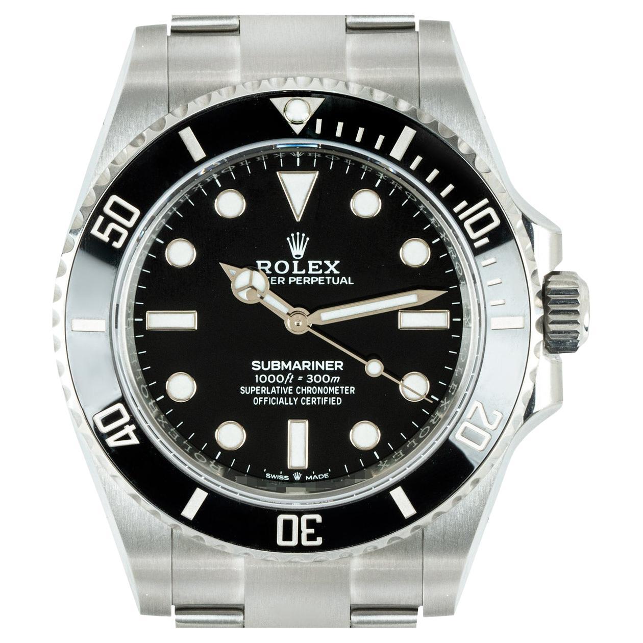 An unworn 41mm Submariner Non-Date in Oystersteel by Rolex. Featuring a black dial and a black ceramic unidirectional rotatable bezel with 60-minute graduations coated in platinum.

The Oyster bracelet comes with a folding Oysterlock clasp which is