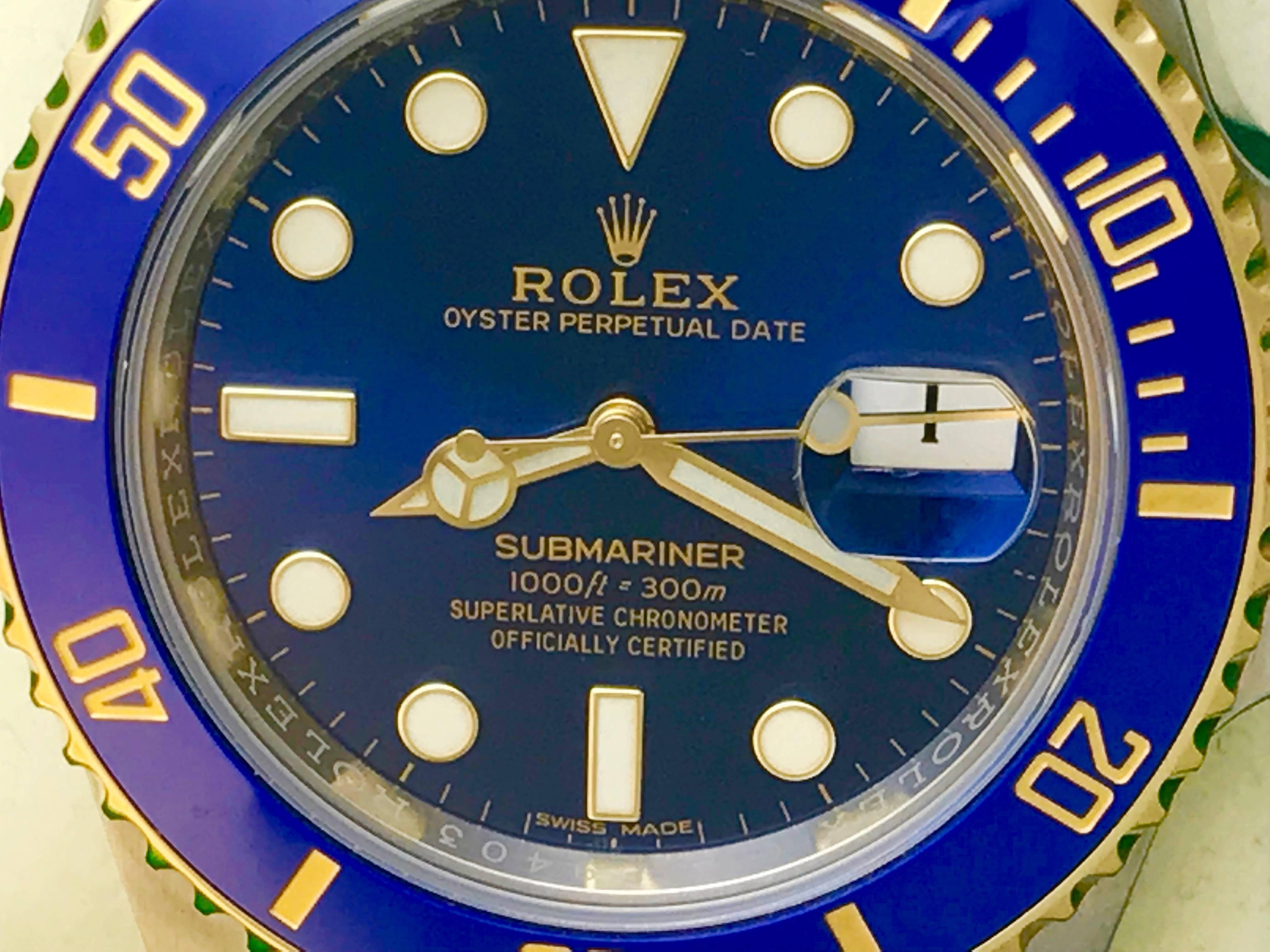 Like New Rolex Mens Submariner Model 116613LB at a great price.  Automatic Winding Oyster Perpetual Date Movement.  Features a Stainless Steel case with 18k Yellow Gold bezel with Blue ceramic insert, diameter 41mm. Stainless Steel & 18k Yellow Gold