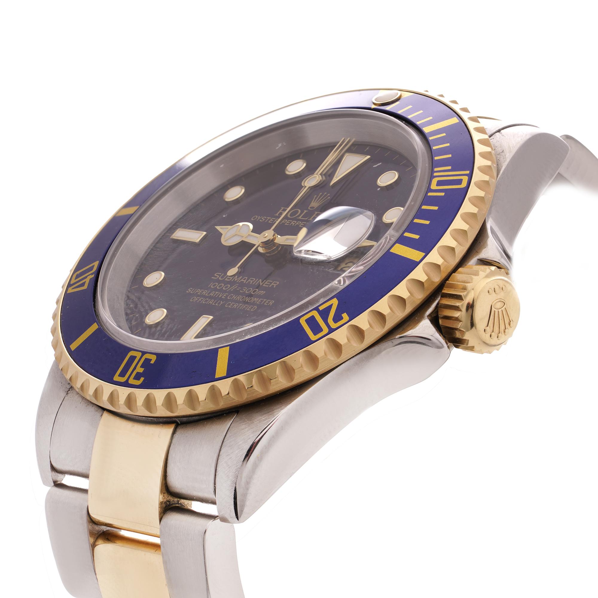 Rolex Submariner Oyster Perpetual Date 18kt yellow gold and stainless steel men's wristwatch. 
Comes with a full set of box and papers. 
The watch was fully serviced in 2024. 
Place of origin: Switzerland 
Period: 2005
Case Diameter: 40 mm
Movement: